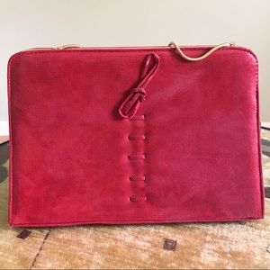Small beautiful red clutch on slim golden chain